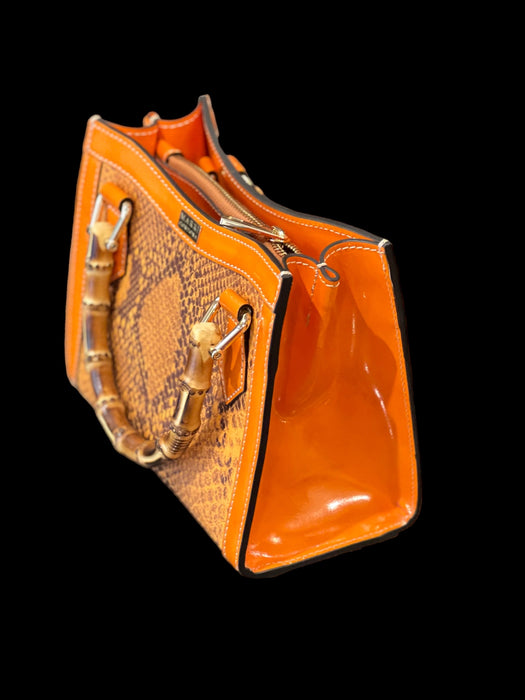 Artemisia bag in orange leather with python print