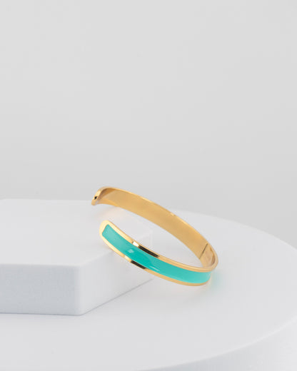 Handcrafted in Tuscany, the MarriCortona Smalto Bracelets in 18k gold and hand-painted enamel embody Italian artistry, color, and timeless elegance.