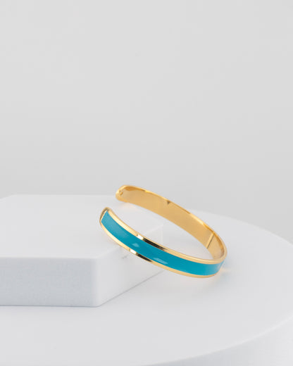Handcrafted in Tuscany, the MarriCortona Smalto Bracelets in 18k gold and hand-painted enamel embody Italian artistry, color, and timeless elegance.