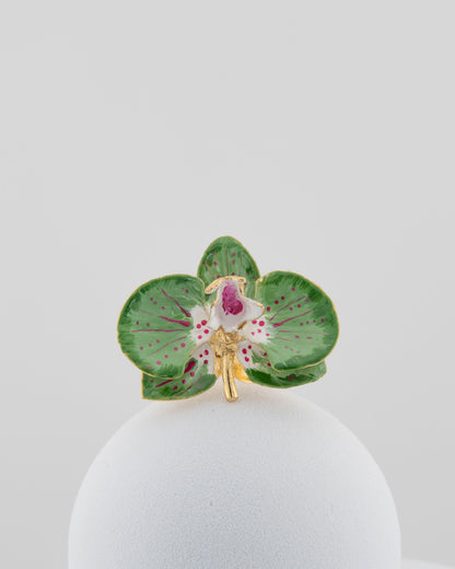Handcrafted in Tuscany, the Marri Cortona Orchidea Ring in 18k gold bronze captures the orchid’s grace — unique, hand-enameled, and timelessly elegant.