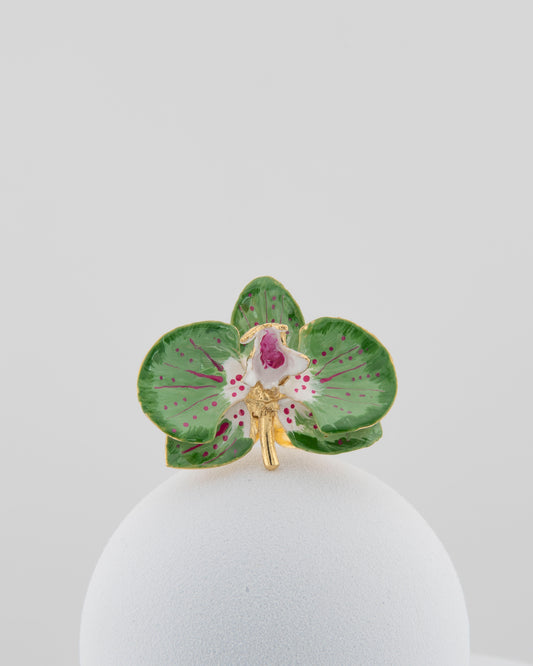 Handcrafted in Tuscany, the Marri Cortona Orchidea Ring in 18k gold bronze captures the orchid’s grace — unique, hand-enameled, and timelessly elegant.
