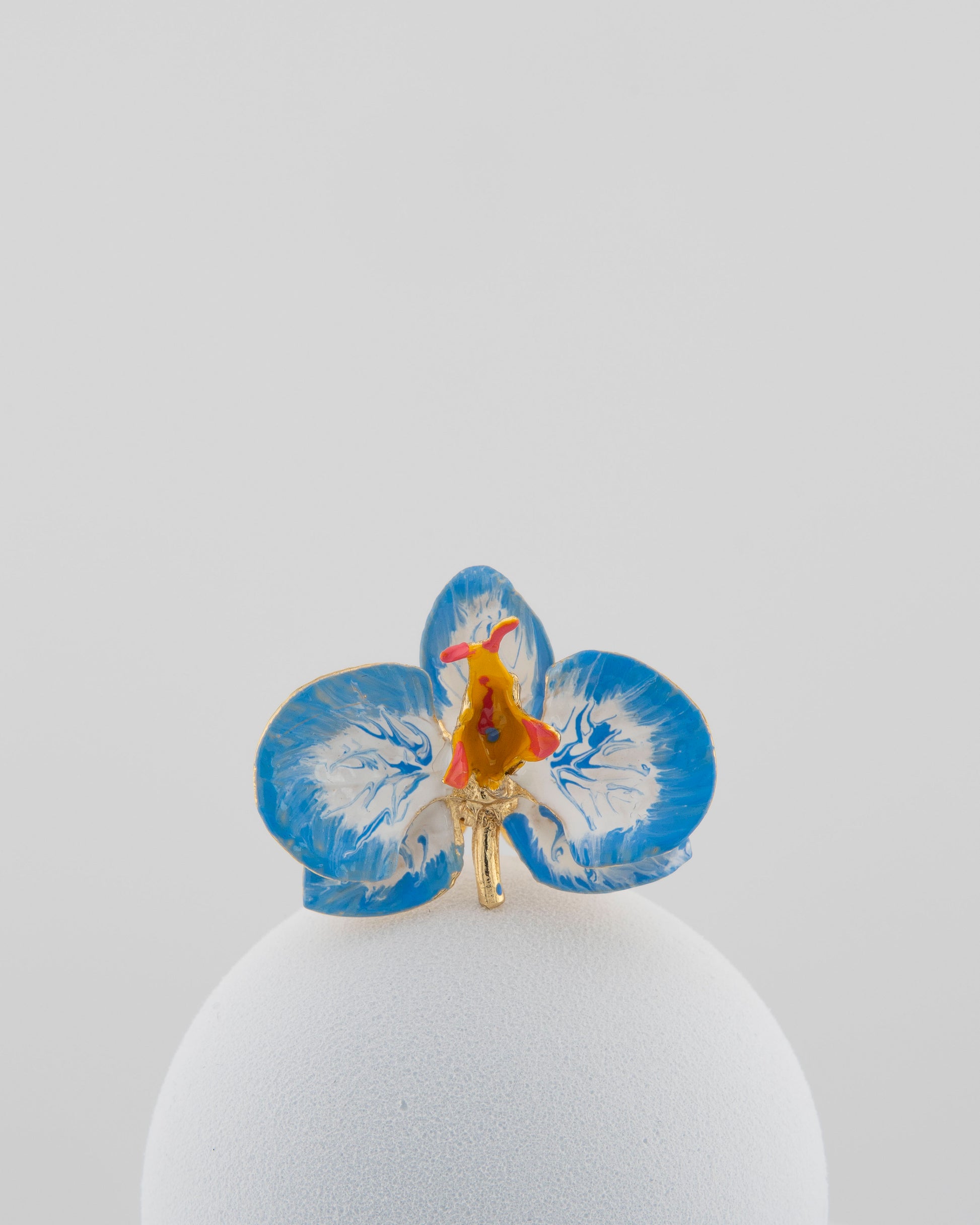 Handcrafted in Tuscany, the Marri Cortona Orchidea Ring in 18k gold bronze captures the orchid’s grace — unique, hand-enameled, and timelessly elegant.