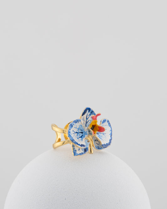 Handcrafted in Tuscany, the Marri Cortona Orchidea Ring in 18k gold bronze captures the orchid’s grace — unique, hand-enameled, and timelessly elegant.