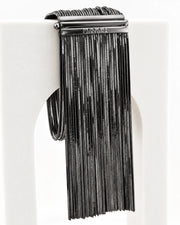 Pulsera 'Voila' baño oro negro. Se adapta a muñecas de hasta 17 cm. Talla S