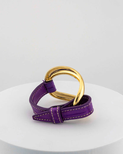 Handcrafted 18K gold-plated bronze bracelet with genuine crocodile leather strap.
An original Marri Cortona design — handmade in Tuscany.