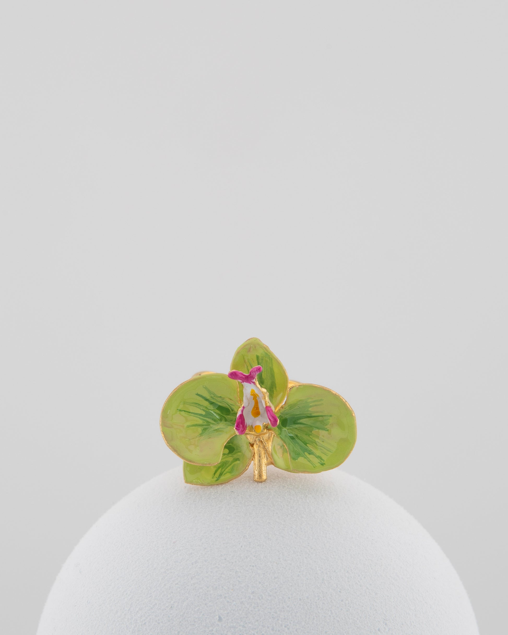Handcrafted in Tuscany, the Marri Cortona Orchidea Ring in 18k gold bronze captures the orchid’s grace — unique, hand-enameled, and timelessly elegant.