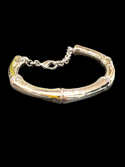 The Bangle Bamboo Bracelet by Marri Cortona, handcrafted in Tuscany, combines lightness, gold elegance, and modern design in timeless Italian style